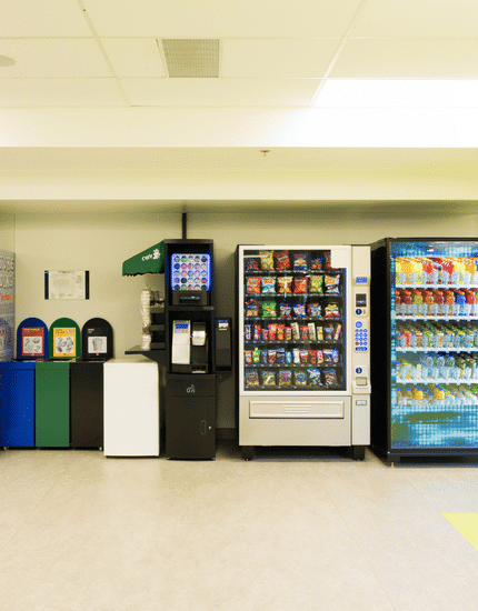 A vending machine in a room.